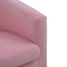 a pink chair sitting on top of a white floor