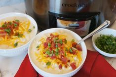 two bowls filled with soup next to an instant pot