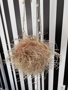 "Beautiful custom, made to order, latte ostrich feather handbag with chain strap. Complete your outfit with this gorgeous feather bag. Dimensions 7\"x7\" Bag does fit the largest iPhone" Feather Purse, Dark Brown Leather Bag, Ostrich Handbags, Ostrich Feather Trim, Bling Bags, Feather Tops, Party Handbags, Utility Bag, Leather Fanny Pack