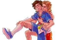 two people are hugging each other while one person is wearing blue and the other has orange shorts