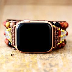 Boho Apple Watch Band Wrap Dress up your tech with this unique Apple Watch bracelet! Refresh your smartwatch with these special beaded band. Call in protection while wearing this gemstone watch band. Attract Calmness while feeling grounded and in balance. Our wrap-around watchband is beautifully handcrafted using high-quality natural Jasper stones loomed on natural brown cord. It comes with an adjustable closure to fit most wrist sizes. Our boho watch strap is the perfect gift for yourself, the Apple Watch Bracelets, Tiger Eye Jewelry, Rose Quartz Jewelry, Bracelet Apple Watch, Power Stone, Picasso Jasper, Positive People, African Turquoise, How To Improve Relationship