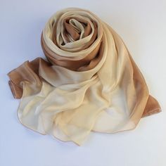 SPECIAL PROMOTION: Please use coupon code "SILKSCARF" to enjoy 10% discount on all scarf orders over $100. Made from premium mulberry silk, this scarf is perfect for an autumn day that is not so chilly. This silk scarf has an brown coloured theme with a gradient pattern from light brown to dark brown. 78 by 25 inch or 78 by 50 inch Fabric: 100% Mulberry Silk Dispatch in 2 days. Regular Shipping via China Post Air Parcel (with limited tracking information and delivers in about 21 days worldwide.) Yellow Hijab, Scarf On Bag, Braun Design, Small Scarf, Soft Autumn, Brown Ombre, Brown Silk, Brown Gradient, Chiffon Scarf