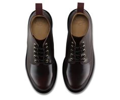 A unique interaction of the classic Dr Martens 1460 boot. Its instantly recognizable DNA looks like this: 8 eyes, classic Dr. Martens Smooth leather, grooved sides, a heel-loop, yellow stitching, and a comfortable, air-cushioned sole. Built on the iconic Dr. Martens air-cushioned sole, which is oil and fat resistant with good abrasion and slip resistance Use Dr. Martens' Wonder Balsam to keep your boots clean, protect the leather, and keep it soft and supple Dr. Martens run true to US size with Dr Martens Emmeline, Cherry Red Dr Martens, Red Dr Martens, Two Tone Boots, Dr Martens Store, Shiny Boots, Ankle Boots Uk, Short Leather Boots, Lace Up Ankle Boots