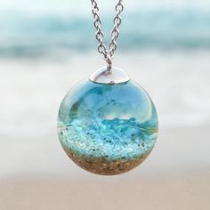 Beach Sand Necklace Ocean Water Necklace Beachy Jewelry - Etsy Strand Necklace With Lobster Clasp As Gift, Strand Necklace With Lobster Clasp For Gift, Gift Necklace With Lobster Clasp And Strand Shape, Blue Ocean-inspired Strand Necklace, Blue Strand Necklace With Ocean-inspired Style, Ocean Color Pendant Jewelry For Beach, Ocean-inspired Pendant Necklace, Handmade Ocean Color Necklace For Gift, Beachy Strand Necklace For Gift