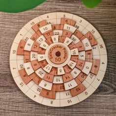 a wooden board with numbers and times on it