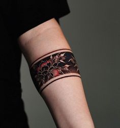 a woman with a tattoo on her arm