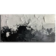 an abstract black and white painting on canvas