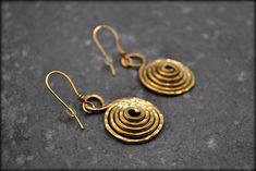 Elevate your everyday style with our spiral everyday earrings, drawing inspiration from the timeless elegance of ancient Greece. These swirl golden earrings boast a geometric hammered design, meticulously crafted for a lightweight feel. With their simple yet timeless appeal, these earrings are perfect for daily wear, adding sophistication to any ensemble. Embrace the allure of ancient Greek aesthetics with these exquisite pieces of artisanal craftsmanship.❤️  The spirals are handmade with brass Handmade Spiral Earrings For Everyday, Handmade Spiral Earrings For Everyday Wear, Hammered Spiral Earrings As Gift, Earrings Drawing, Hammered Earrings, Golden Earrings, Inspired Jewelry, German Silver, Everyday Earrings