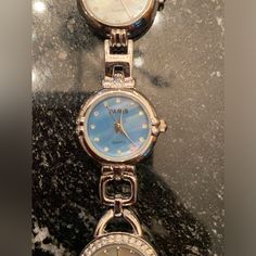 New Never Worn, Rare Find! Beautiful Watch With Time Zones For Us, Paris, Tokyo, New York And Beverly Hills. Silver Tone And Stainless Steel, Japan Movement, Fold Over Clasp. Good Condition Except Need New Batteries. Luxury Collectible Manual Winding Watches And Jewelry, Tiffanys Watch, Beautiful Watch, Time Zones, Beautiful Watches, Fold Over, Silver Watch, Beverly Hills, Accessories Watches