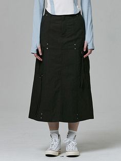 This is a casual and comfortable skirt that is made out of high quality cotton and nylon blend fabric. With design detail of vintage washed fabric, vent on the back, and D-ring detail, it gives a trendy and casual mood.- Side cargo pockets- Unique structure with rivets and eyelets- Vintage washed fabric- Back opening Black Cotton Cargo Skirt For Streetwear, Black Cotton Utility Skirt, Black Cotton Cargo Skirt With Pockets, Casual Wide-leg Cargo Skirt With Pockets, High-waist Black Cargo Skirt With Belt Loops, Knee-length Relaxed Cotton Cargo Skirt, High-waist Stretch Cotton Cargo Skirt, Comfortable Skirts, D Ring