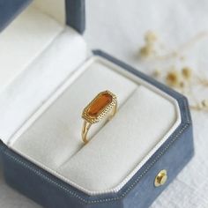 ✦ Celebrate your loved one's birthday in style with the S925 Classic Gold Plated Baguette Amber Ring, a beautiful birthstone ring that is both stylish and meaningful. The ring features a baguette-cut amber stone that represents the birthstone for the month of November, making it the perfect gift for anyone born in that month. The classic gold-plated band and vintage-inspired design add a touch of elegance and sophistication, making this ring a cherished piece that will be treasured for years to Engagement Rings Amber Stone, Luxury Amber Promise Ring Jewelry, 2024 Manifestations, Amber Rings, Month Of November, Gemstone Rings Vintage, Basic Jewelry, Crystal Hoop Earrings, Nose Rings Hoop