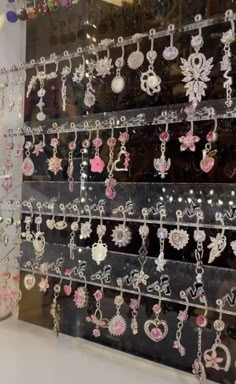 a display case filled with lots of earrings