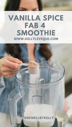 a woman is using a blender to make vanilla spice smoothie in the kitchen