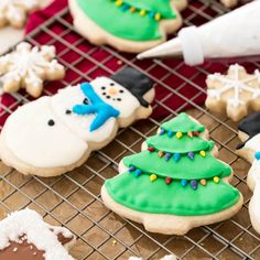 decorated christmas cookies on a cooling rack