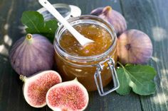 figs and honey on a wooden table