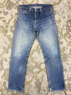 Distressed Blue Vintage Levi's Jeans 33x30 Denim- JN3593 Size: 33 Actual measurement (inches): Waist - 33 Front Rise - 10.5 Hips - 42 Thigh - 11 Knee - 7.5 Leg Opening - 14 Inseam - 30 Outseam - 40.5 Material : Cotton    #JN3593 Distressed Straight Denim Jeans, Straight Distressed Denim Jeans, Mid-rise Washed Light Indigo Jeans, Distressed Straight Denim Blue Jeans, Straight Distressed Denim Blue Jeans, Dark Wash Distressed Straight Bottoms, Light Wash Straight Distressed Bottoms, Mid-rise Distressed Medium Wash Jeans, Straight Washed Denim Jeans