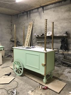 an old fashioned cart is being worked on