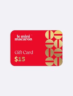 the le mini macaron gift card is $ 15, and has gold circles on it