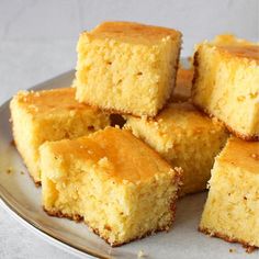 several pieces of cake sitting on top of a plate