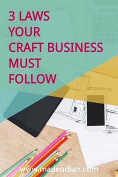 a desk with pencils and paper on it that says 3 laws your craft business must follow