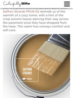 a paint can with a brush in it and the caption says, saffron strands p - 002 reminds us of the warmth of a cozy home