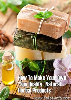 soap bars stacked on top of each other next to flowers and a bottle of oil