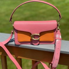 Polished Pebble Leather Inside Zip And Multifunction Pockets Snap Closure, Fabric Lining Outside Slip Pocket Detachable Short Strap With 7 3/4" Drop Detachable Long Strap With 21 1/4" Drop For Shoulder Or Crossbody Wear 10 1/4" (L) X 6" (H) X 3" (W) Coach Color Block Purse, Pink Color Block Rectangular Shoulder Bag, Pink Rectangular Color Block Shoulder Bag, Rectangular Pink Color Block Shoulder Bag, Pink Square Satchel With Detachable Strap, Pink Satchel Flap Bag With Detachable Strap, Pink Leather Tote Flap Bag, Pink Satchel Flap Bag For Shopping, Pink Flap Bag With Detachable Strap For Shopping