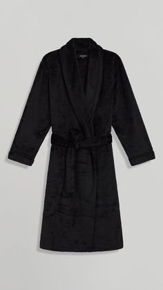 Wrap yourself in luxurious comfort and timeless elegance with our Ellen Tracy Full Length Robe. Crafted from recycled chenille, this robe not only pampers you but also embraces sustainability. The tie waist ensures a customizable fit while accentuating your feminine silhouette. With its classic silhouette and effortless style, this robe exudes timeless femininity. Effortlessly easy to wear, it's perfect for cozy evenings or leisurely mornings. Experience the ultimate blend of comfort and eco-con Plush Robe, Feminine Silhouette, Conscious Fashion, Ellen Tracy, Classic Silhouette, Fabric Care, Effortless Style, Timeless Elegance, Unique Style