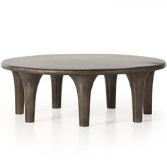 an oval coffee table with metal legs and a wooden top, on a white background