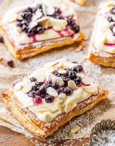 blueberry and almond pastry with powdered sugar on top