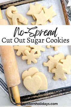 no - spread cut out sugar cookies on a baking sheet