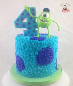 a blue and purple cake with the number four on it