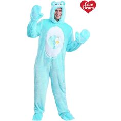 a man in a blue bear costume standing up with his arms out and smiling at the camera