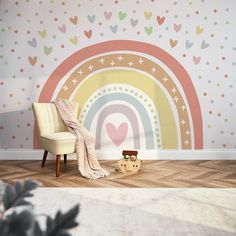 a room with a chair, rug and rainbow wall mural on the wall behind it