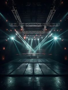 an empty stage with bright lights in the dark