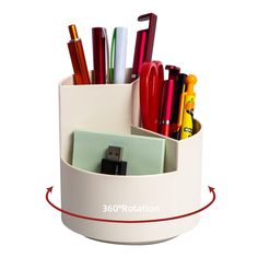 a pen holder with pens and markers in it