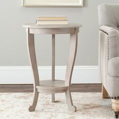 a small table with a book on top