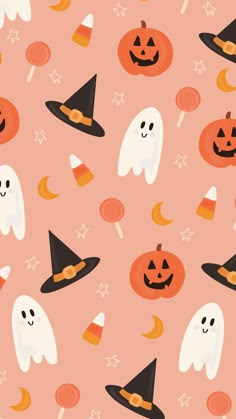 a halloween pattern with pumpkins, candy and ghost faces on a peach colored background