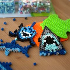 some plastic beads are laying on a table