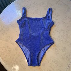 Berlock Women's Size S (Us 2-4) Lurex One Piece Swimsuit Square Neck Tummy Control Backless Bathing Suit Shimmer Material Depends How Light Hits It ( Sometimes Looks Blue Sometimes Purple ) High Cut Nwot 80% Recycled Polyamide 11% Spandex 9% Metallic Bust 34-36 Waist 26.8 Hip 37 Item# 294 Blue Stretch One-piece For Party, Blue Sleeveless One Piece For Party, Sleeveless Blue One-piece For Party, Blue Fitted One Piece For Party, Backless Bathing Suits, High Cut, Bathing Suit, Blue Purple, Square Neck