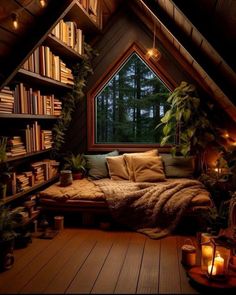 an attic bedroom with lots of bookshelves and plants on the shelves, along with candles