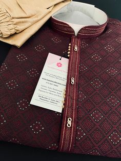 Welcome to our shop! Discover the elegance of our handmade Wine color Indian kurta for men. This traditional ethnic wear is meticulously crafted to blend timeless style with modern comfort. Perfect for various occasions, this kurta adds a touch of Indian heritage to your wardrobe. Designer Men's Kurta Pajama Set with Embossed design pattern with small zari buttis drops all over the Kurta and fancy neckline Please note - Kurta has Sherwani Style and not Sherwani. It is fully lined like a sherwani Traditional Jamawar Nehru Jacket, Ceremonial Jamawar Kurta With Cutdana Details, Ceremonial Jamawar Kurta With Dabka Work, Ceremonial Jamawar Kurta With Cutdana, Traditional Bandhgala With Cutdana, Traditional Bandhgala For Festive Occasions, Traditional Kurta With Dabka Work For Ceremonial Occasions, Traditional Kurta With Dabka Work For Ceremonial Events, Embroidered Traditional Fit Kurta For Wedding