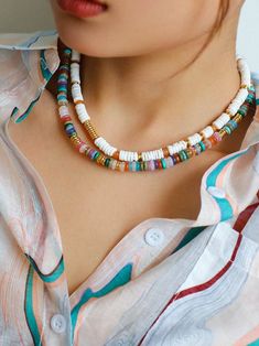 Discover the stunning beauty and versatility of our Natural Stone Colorful Beaded Necklace. Featuring a kaleidoscope of vibrant natural gemstones, this accessory adds a pop of color and authenticity to any outfit. Metal: 18K Recycled Gold Plated on Brass Gemstone:Natural Multi Stone,White Shell Necklace Length:410mm-460mm Weight: 30g Unique Multi-strand Colorful Beaded Necklaces, Beach-style Multicolor Long Necklace With Large Beads, Beach-style Large Beads Multicolor Necklace, Nature-inspired Multicolor Gemstone Beads Necklace, Multicolor Multi-strand Crystal Necklaces With Colorful Beads, Gemstone Beaded Necklace, Recycled Gold, Shell Necklaces, Multi Stone