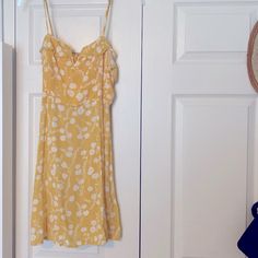 Brand New. Never Worn. Tags Still On. Yellow Floral Sundress. Size M. Yellow Floral Sundress, Gold Shimmer Dress, Light Blue Mini Dress, Tan Mini Dress, Sangria Dress, Fendi Dress, Cold Shoulder Shift Dress, Velvet Slip Dress, Blue Bodycon Dress