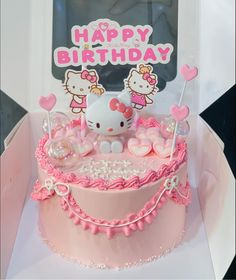 a hello kitty birthday cake in a box