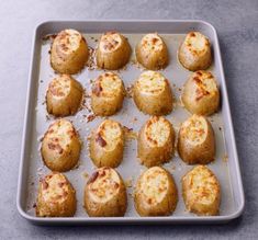 a pan filled with baked food on top of a counter