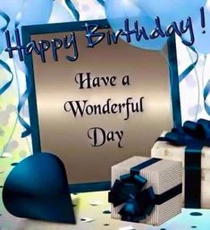 happy birthday have a wonderful day card with gift boxes and blue ribbon on the table