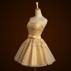 Sleeveless Gold Homecoming Dress Gold Dama Dresses, Gold Homecoming Dress, Gold Dress Short, Dama Dresses, Graduation Party Dresses, Gold Bridesmaid Dresses, Satin Homecoming Dress, Cheap Homecoming Dresses, Prom Dresses Sleeveless