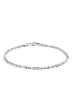 A sterling silver bracelet features a twisted rope design for textural flair. 7" length Clasp closure Sterling silver Imported Silver Tennis Bracelet With Chain Link, Silver Chain Link Jubilee Tennis Bracelet, Classic Rope Chain Bracelet, Elegant Rope Chain Link Bracelet, Classic Rope Chain Bracelet Jewelry, Elegant Sterling Silver Wheat Chain Bracelet, Elegant Bracelets With Rope Chain And Link Shape, Elegant Bracelets With Link Rope Chain, Elegant Bracelets With Rope Chain Link