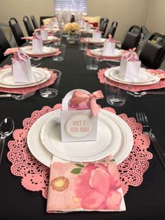 the table is set with place settings and napkins for guests to enjoy their meal